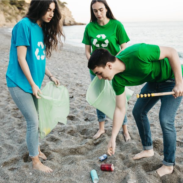 group-volunteers-collecting-trash-beach